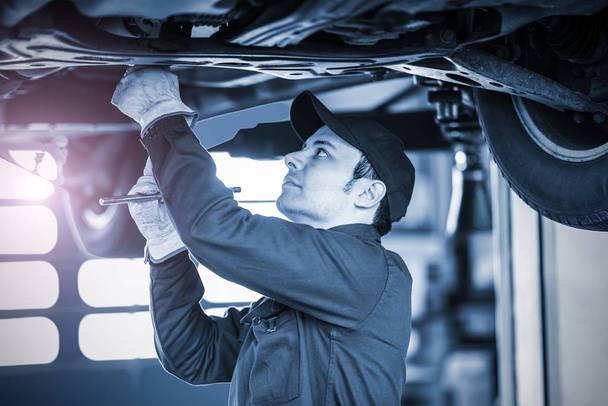 Young mechanic at work - Фото, изображение