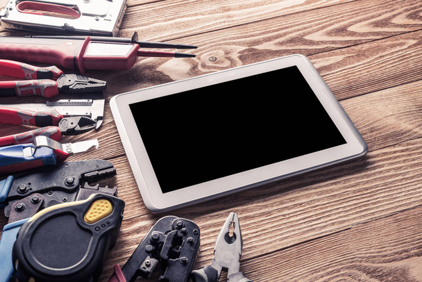 Variety of tools of builder and tablet pc - Foto, imagen