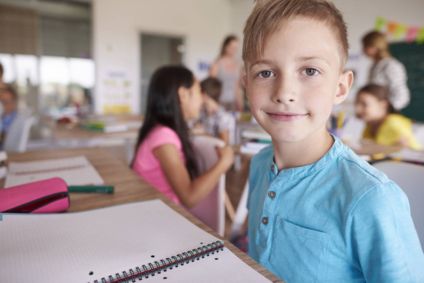 boy sitting in classroom at school - Photo, Image