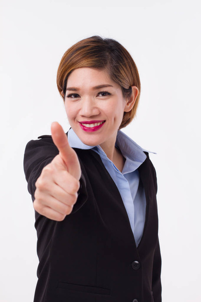 happy, successful, smiling businesswoman giving thumb up, approval, good, ok hand gesture - Fotó, kép
