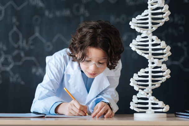 Little intelligent researcher studying - Photo, Image