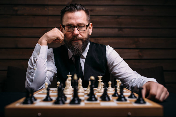 pensive chess player  - Valokuva, kuva