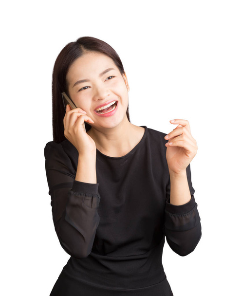asian young happy laughing woman talking on her cellphone, white - Fotó, kép