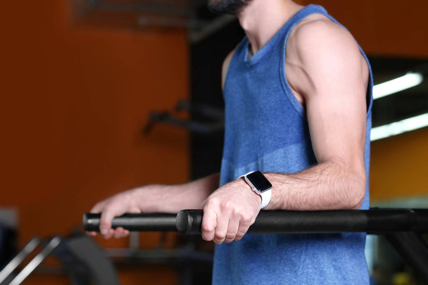 Young man with fitness tracker - Fotografie, Obrázek