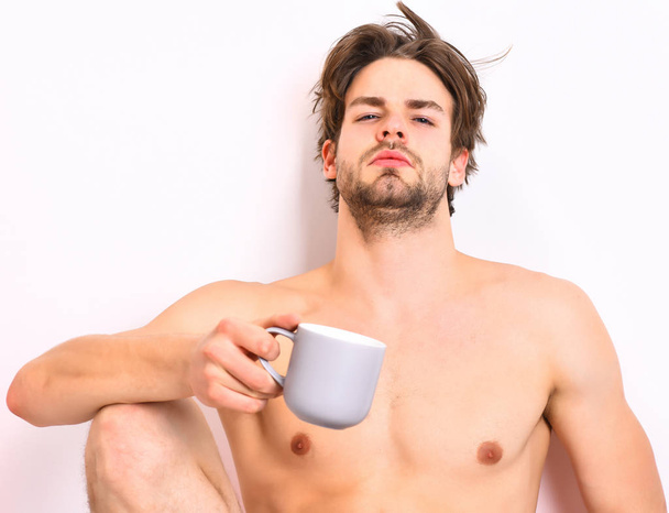 Caucasian bearded sexy macho holding coffee cup - Foto, Imagem
