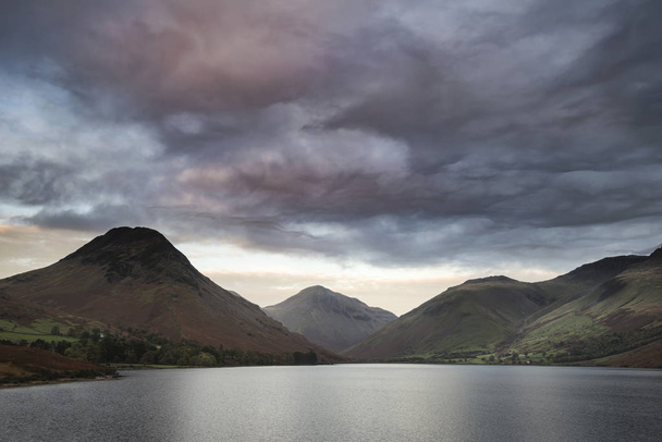 Beautiful landscape image of mountains around Wast Water in Lake - Photo, Image