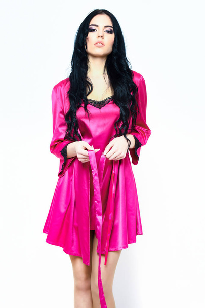 sexy girl posing in pink silk robe isolated on white - Zdjęcie, obraz