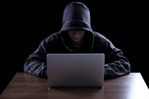 Anonymous hacker in the dark - Valokuva, kuva