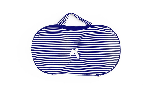 Tekening blauwe en witte strepen tas voor bras, voor reizen, isol - Foto, afbeelding