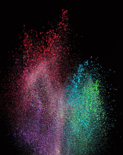 Colored powder explosion on black background. - Valokuva, kuva
