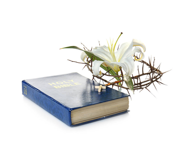 Bible, crown of thorns and white lily - Photo, Image
