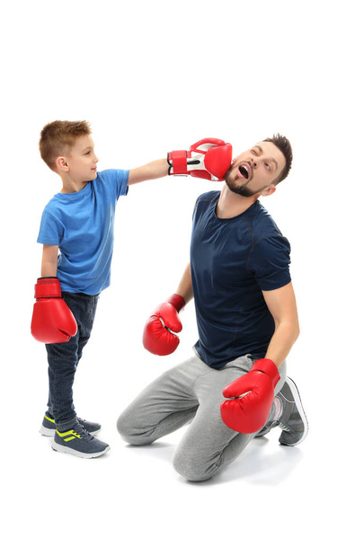 Father and son during boxing training - Φωτογραφία, εικόνα
