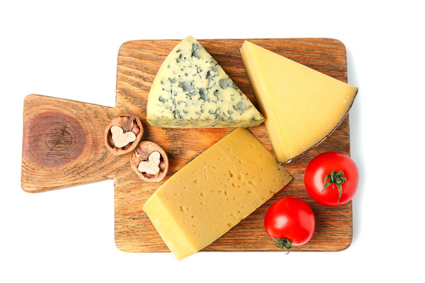 Board with assortment of cheese and  tomatoes - Photo, image