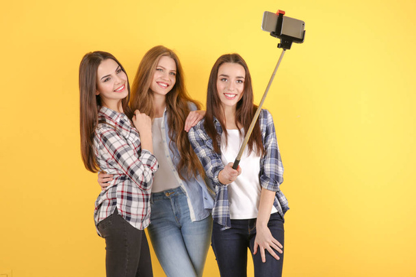 Beautiful young women taking selfie   - Fotografie, Obrázek