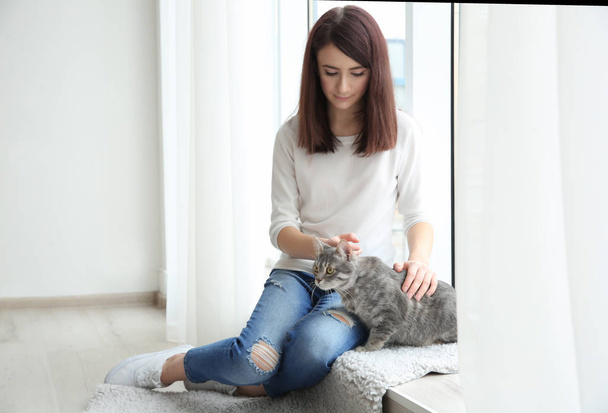 Beautiful woman with cute cat   - Photo, Image