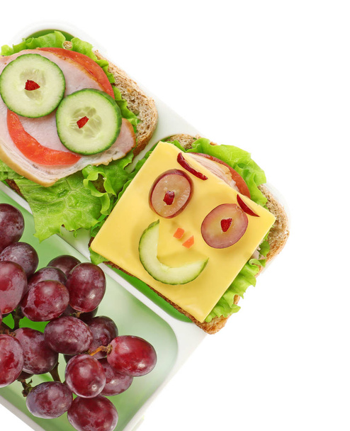 Lunch box with funny sandwiches  - Фото, зображення
