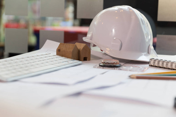 Structural engineer and architect desk with safety helmet, bluep - Photo, Image