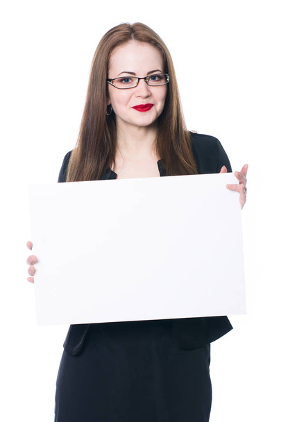Pretty business woman in glasses holding a blank sign - Foto, afbeelding