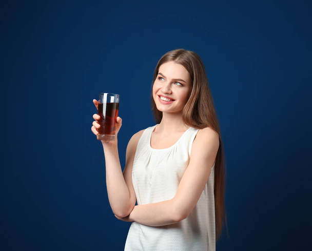 young woman with glass of juice - Zdjęcie, obraz