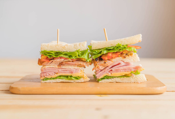 chicken ham sandwich on wood background - Фото, зображення