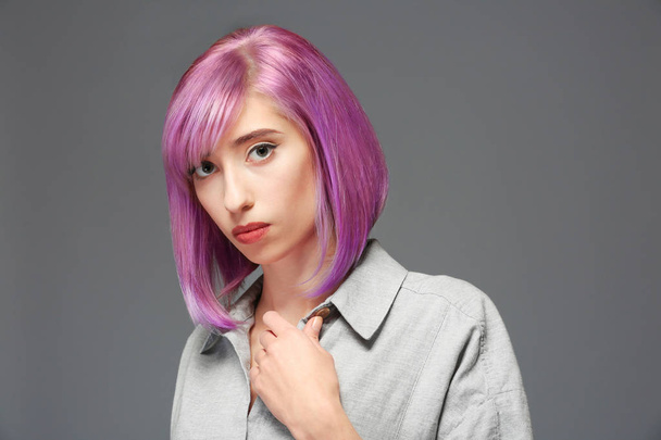 Beautiful young woman with dyed hair   - Photo, Image