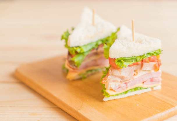chicken ham sandwich on wood background - Фото, изображение