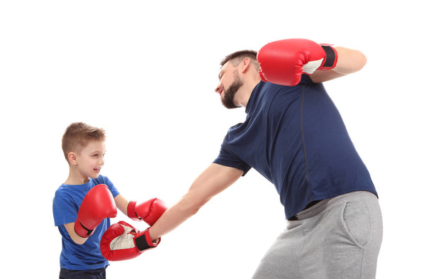 Father and son during boxing training - Foto, Bild