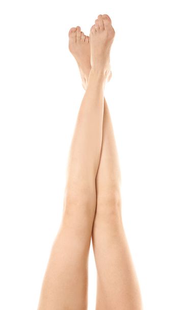 Beautiful female legs on white background - Foto, afbeelding