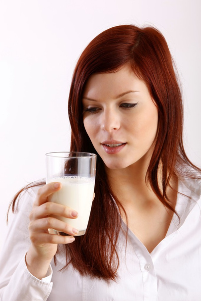 Face of woman drinking milk - Foto, Imagem