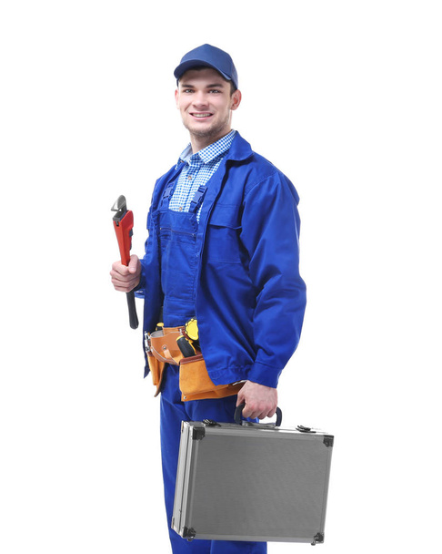 plumber holding pipe wrench - Фото, зображення