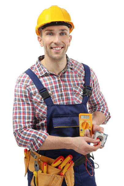 Young electrician holding socket   - Photo, Image