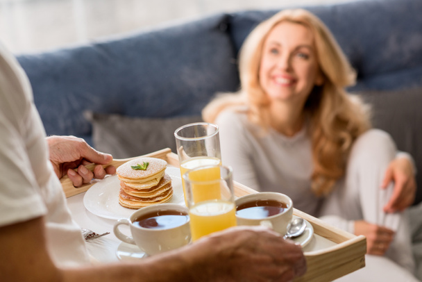 Couple having breakfast in bed  - Photo, image