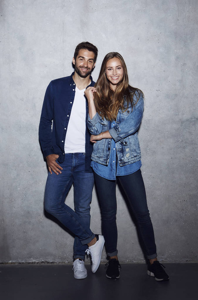 Smiling couple in denim clothes  - Foto, afbeelding