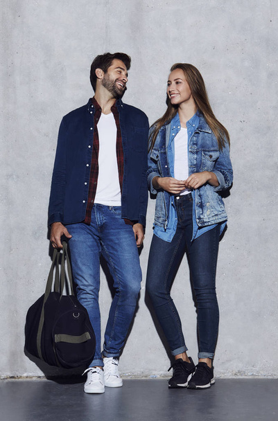 Laughing couple in denim clothes - Foto, afbeelding