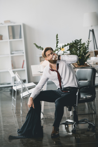 Drunk businessman in office  - Photo, image