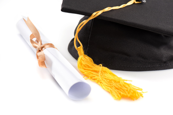 Mortero y diploma de graduación
  - Foto, Imagen