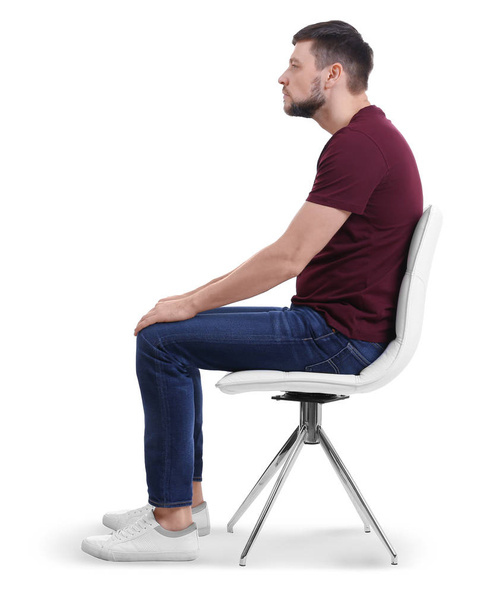  Man sitting on chair  - Foto, Bild