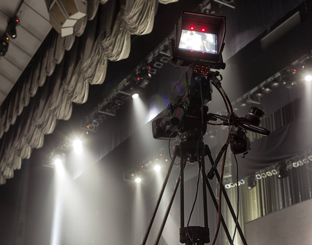 tv camera in a concert hal. Professional digital video camera. - Photo, Image