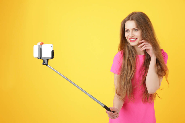 Beautiful young woman taking selfie   - Fotoğraf, Görsel