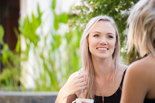  blond female models having coffee  - Photo, image