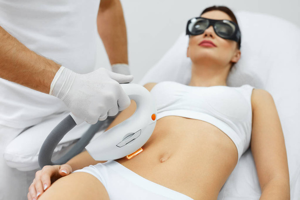 Cosmetic Procedure. Beautiful Woman Receiving Skin Treatment - Fotó, kép