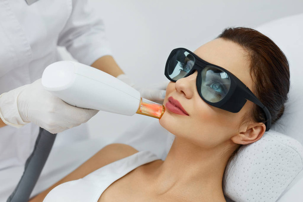 Beautiful Woman Receiving Beauty Treatment. Laser Procedures.  - Valokuva, kuva