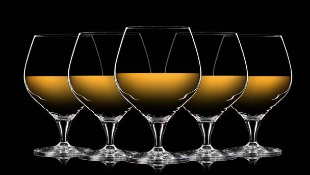 Set of colorful whiskey glasses on black - Foto, Bild