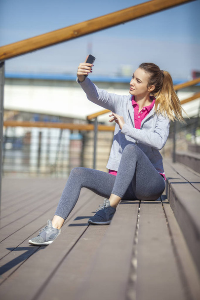 A young woman on recreation and jogging - Φωτογραφία, εικόνα