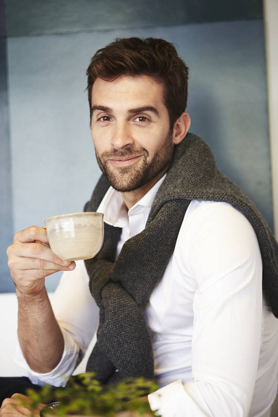 Man holding coffee cup - Photo, image