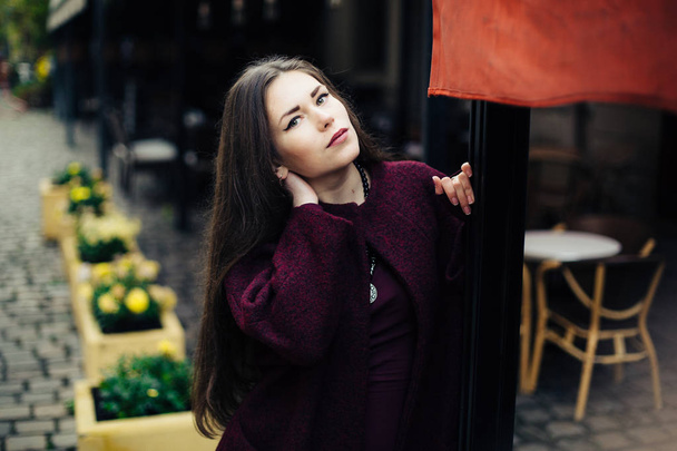  young woman in  coat posing - Foto, Imagem