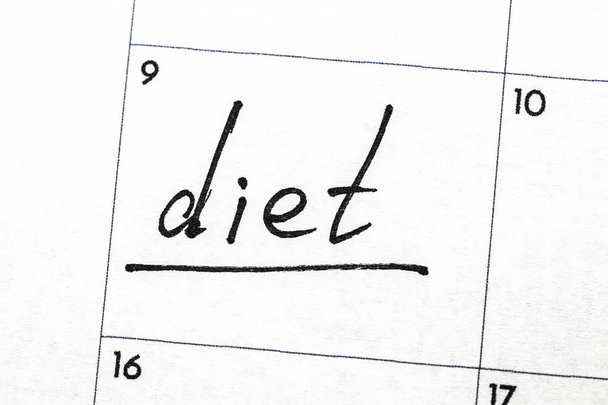 "diet" sign written with a marker on the calendar - Foto, Bild