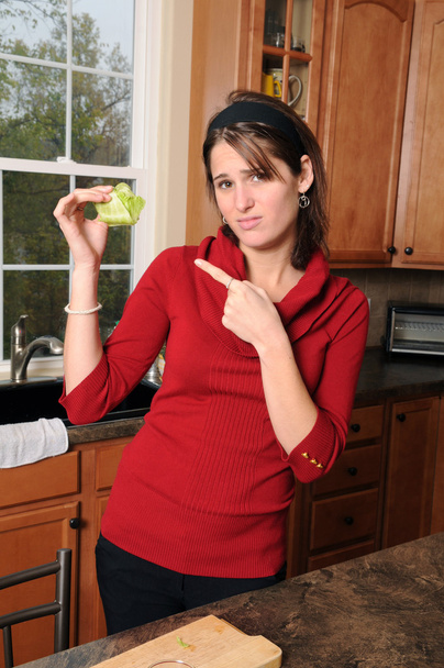 Young Woman Holding Lettuce - Fotó, kép