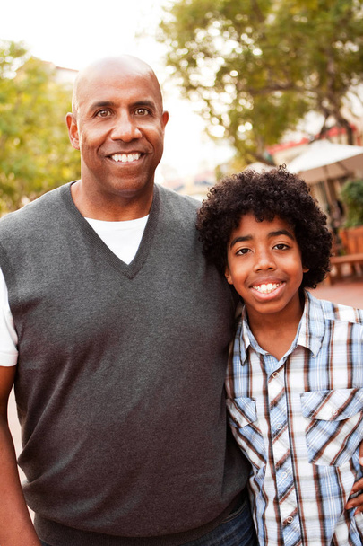African American father and son spending time together. - Foto, Bild