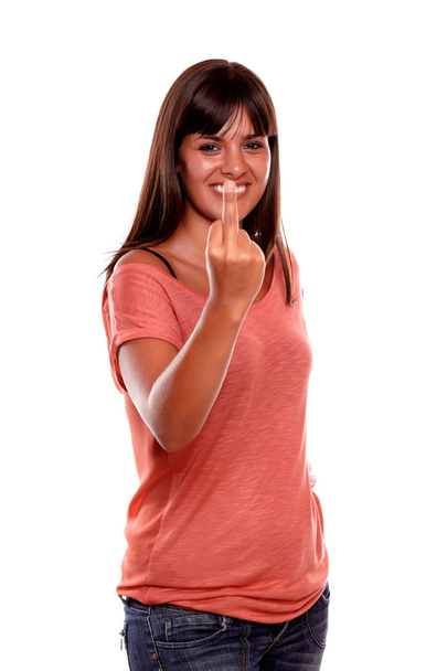 Angry latin young woman giving you the finger - 写真・画像